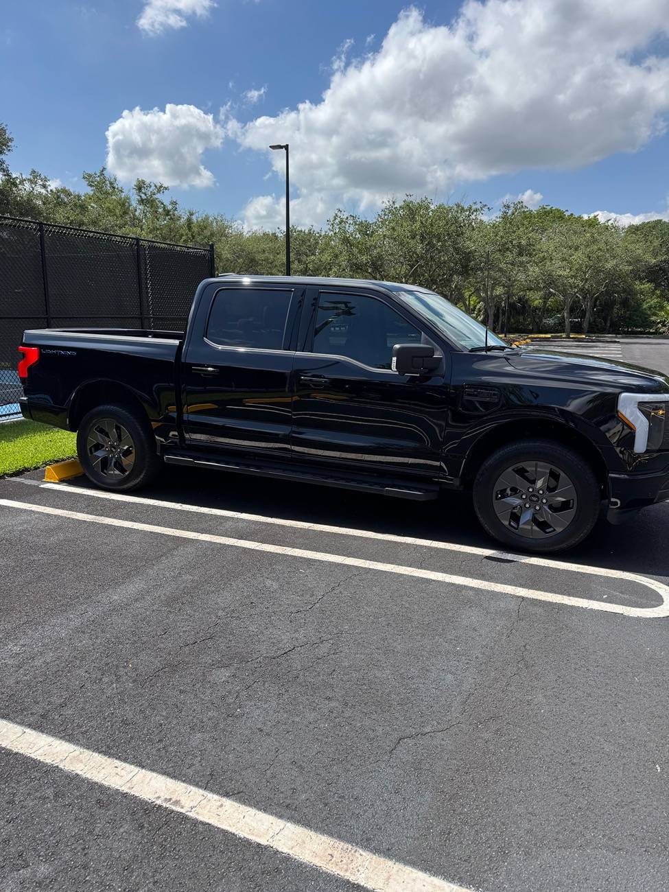 Ford F-150 Lightning Vehicle height in the rear? Used truck, did prior owner lift the rear? IMG_4227