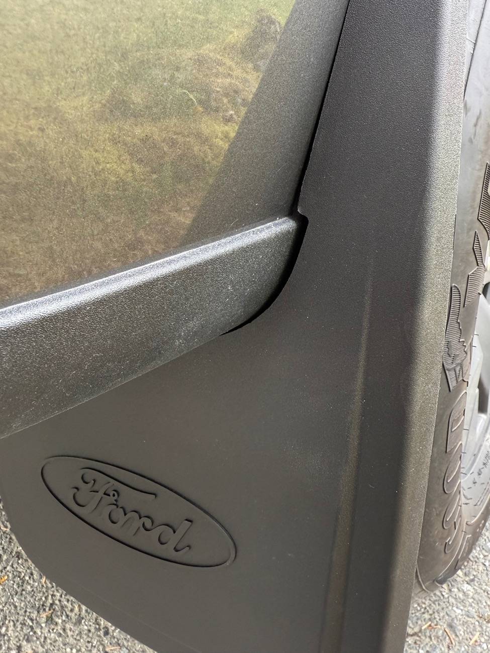 Ford F-150 Lightning Ford Rear Splash Guards install on Lightning Flash IMG_0249