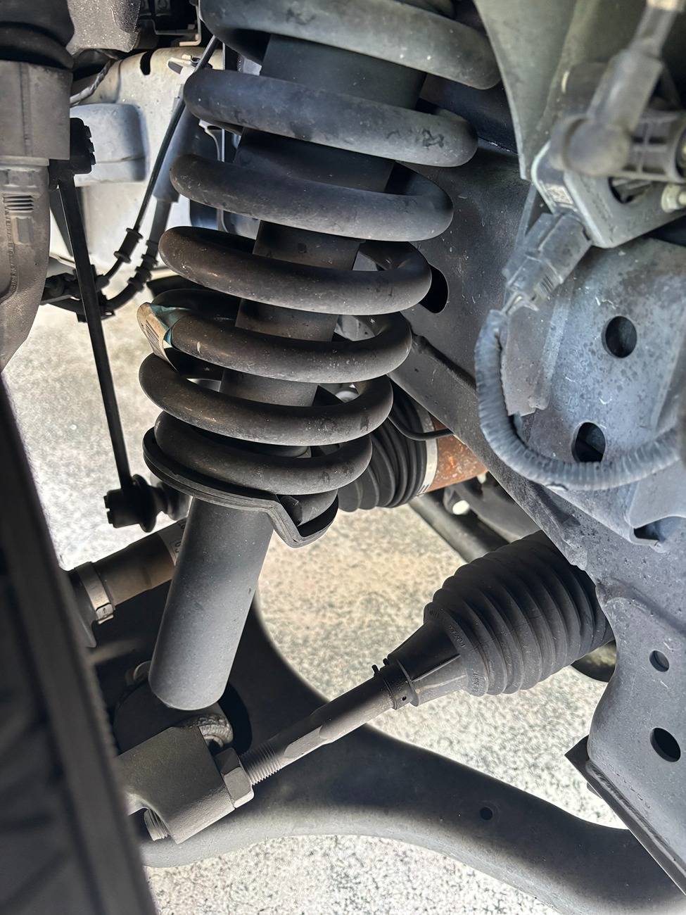 Ford F-150 Lightning 2022 Lightning: What is the Current best shock combo to counter bouncy ride? IMG_5052