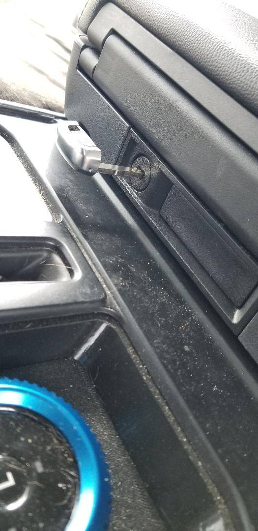 Ford F-150 Lightning OEM built-in center console lock... Who Knew? (I certainly didn't know) Console lock - open