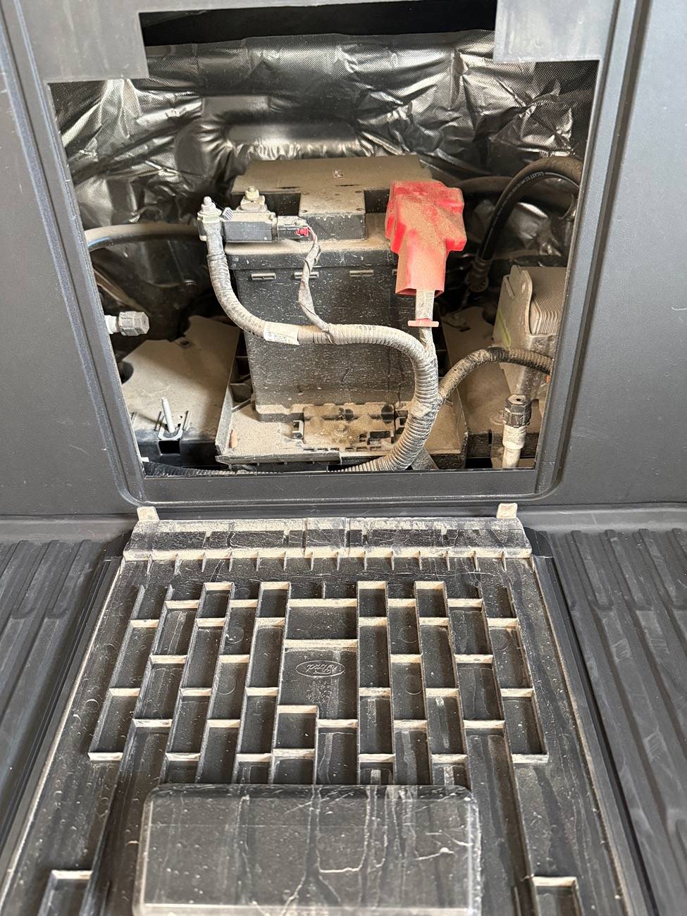 Ford F-150 Lightning Dirt in 12V Battery Bay Area IMG_9541