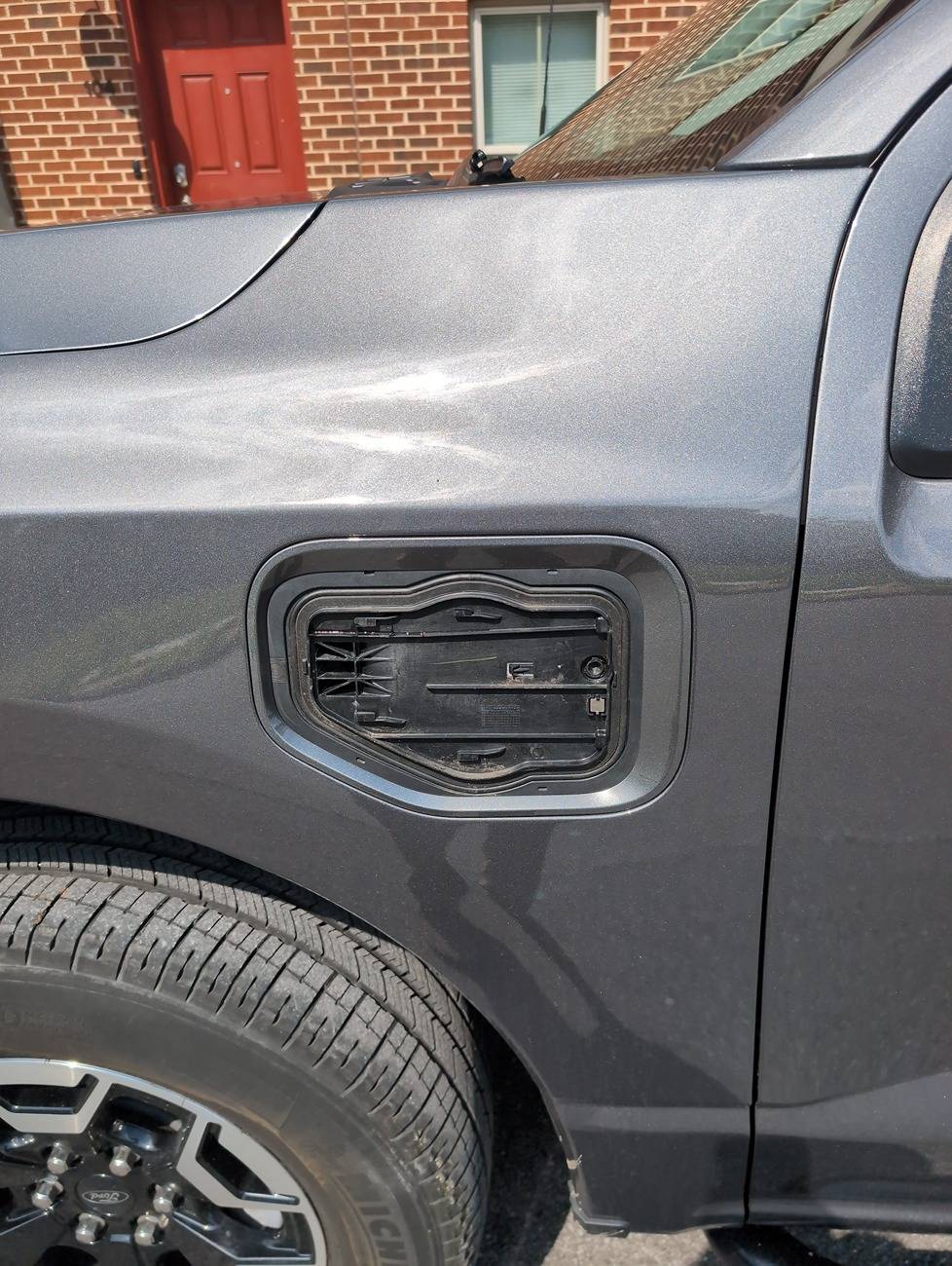 Ford F-150 Lightning Looking for a replacement charge port door badge 17520028825295162645823014015467