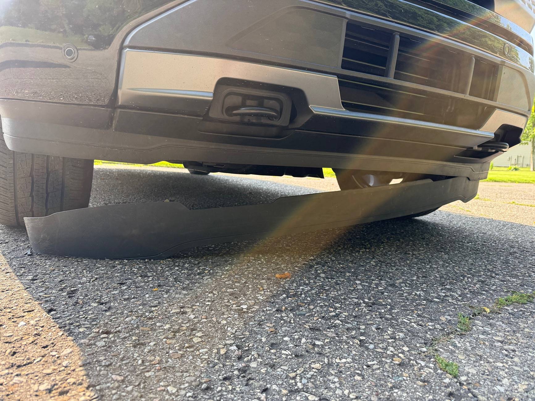Ford F-150 Lightning Active Air Dam defeated by tire carcass... IMG_5384