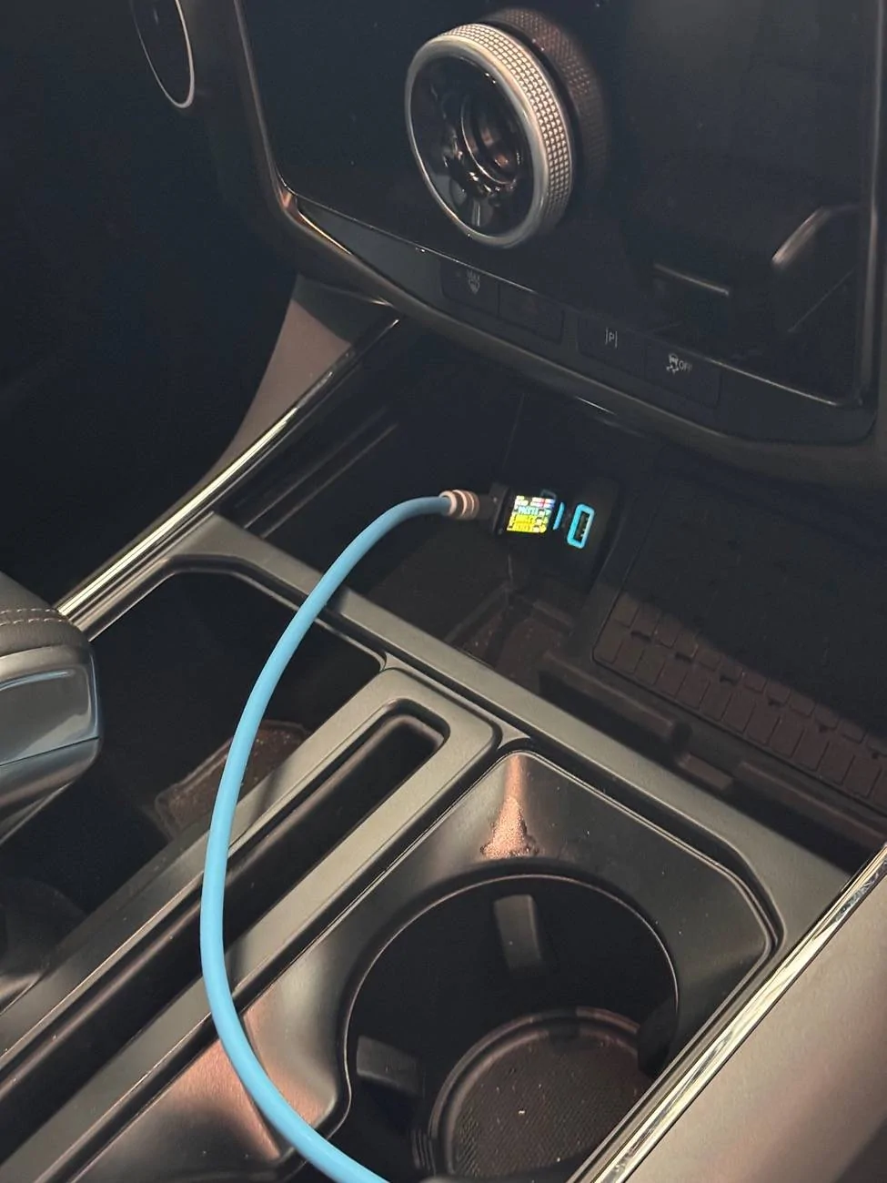 Ford F-150 Lightning Add additional power to front storage/cubby area IMG_0193