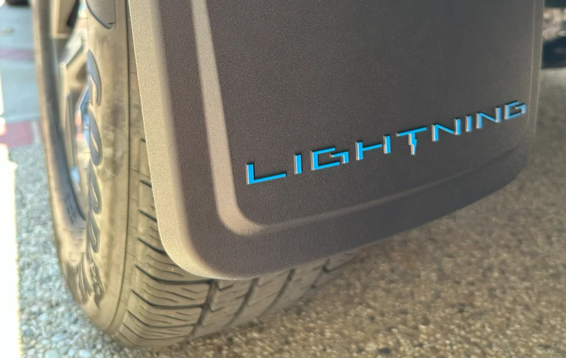 Ford F-150 Lightning Mudflaps with flair (using paint pen) 1754683036622-o