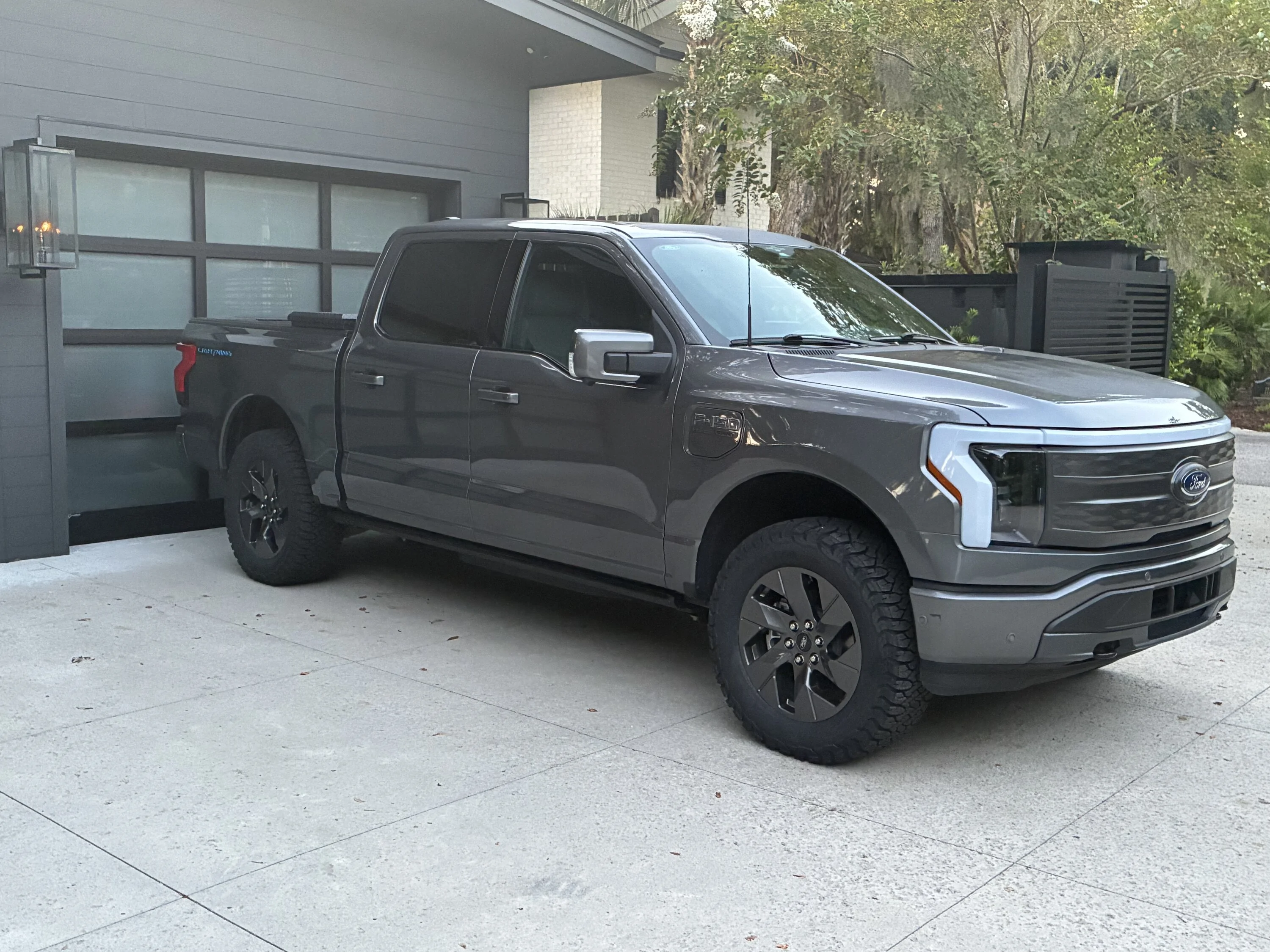 Ford F-150 Lightning Pics and range info: Eibach 2.6” leveling shock and KO3 295/60/20 tires on Lariat ER IMG_4653