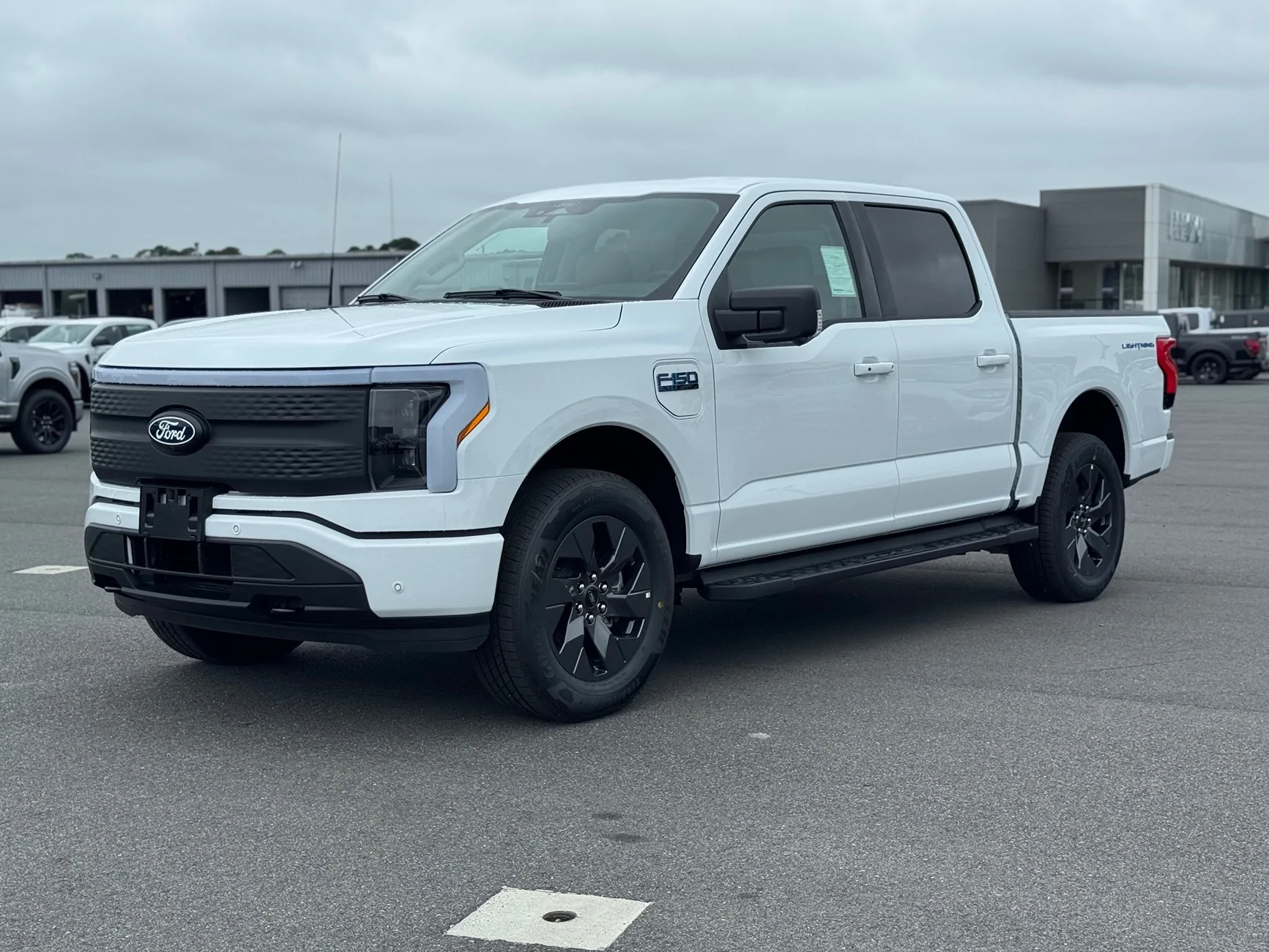 Ford F-150 Lightning WTT or WTB stock gloss black wheels IMG_1952