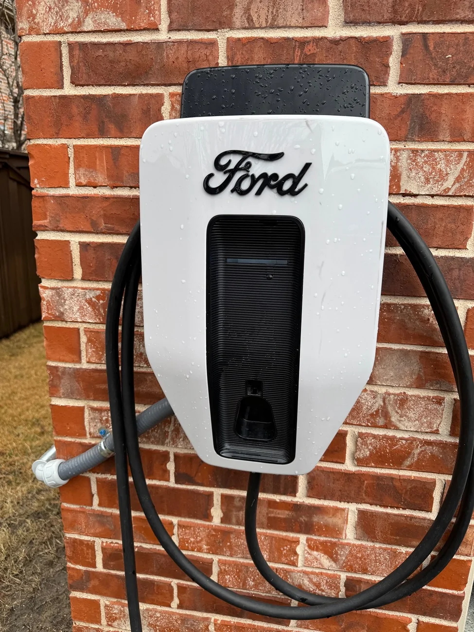 Ford F-150 Lightning 80A Charging Cable Under Garage Door IMG_1384