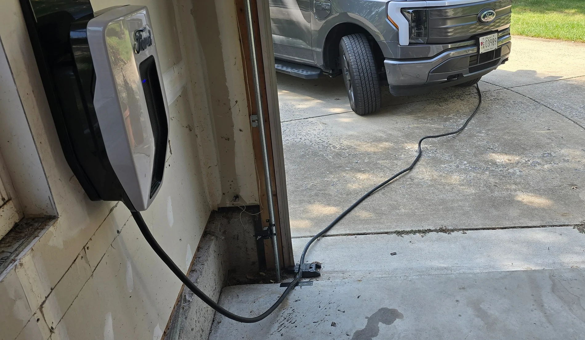 Ford F-150 Lightning 80A Charging Cable Under Garage Door 20250923_104708