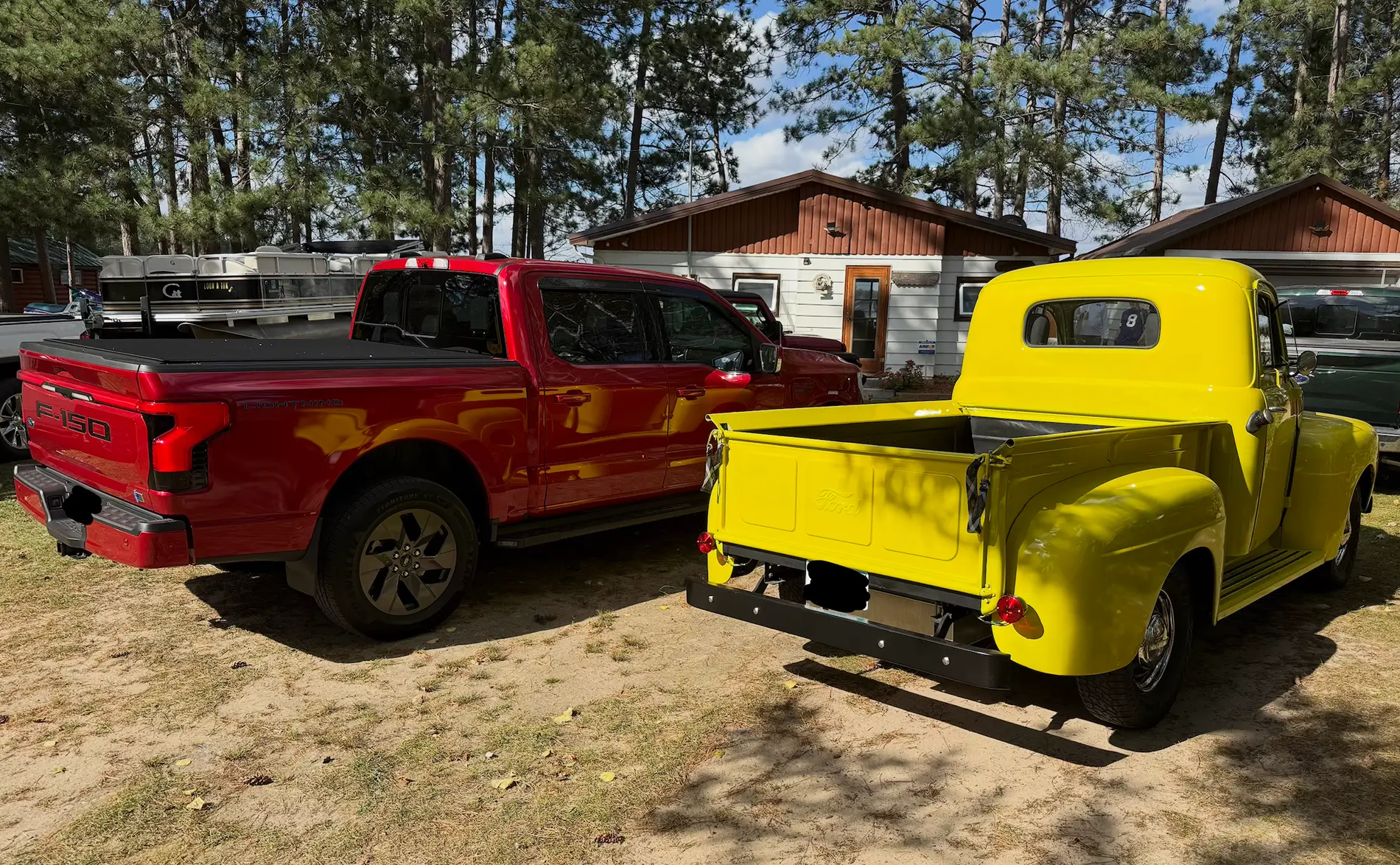 Ford F-150 Lightning 1950 F-1 and 2023 F-150 Lightning hanging out Screenshot 2025-10-10 at 1.13.12 PM