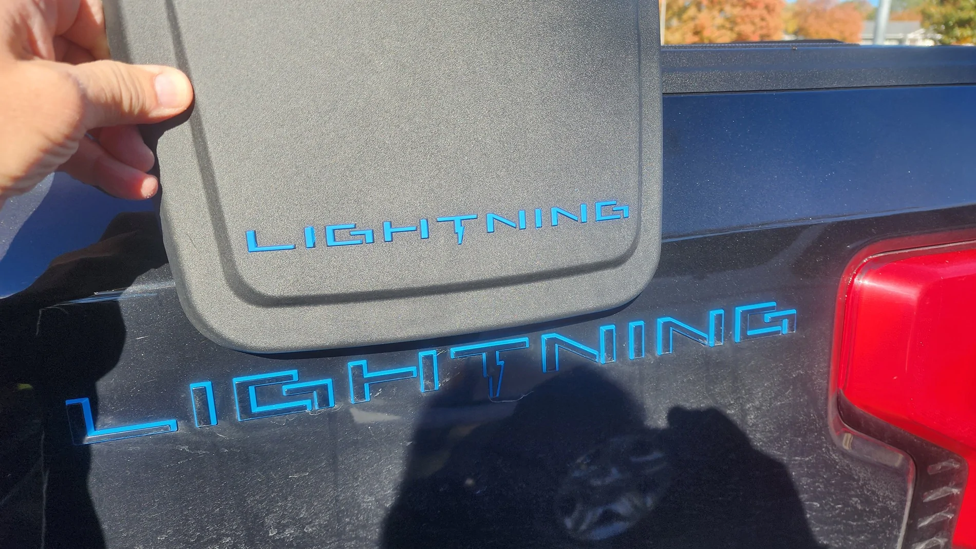 Ford F-150 Lightning Mudflaps with flair (using paint pen) 20251107_131830