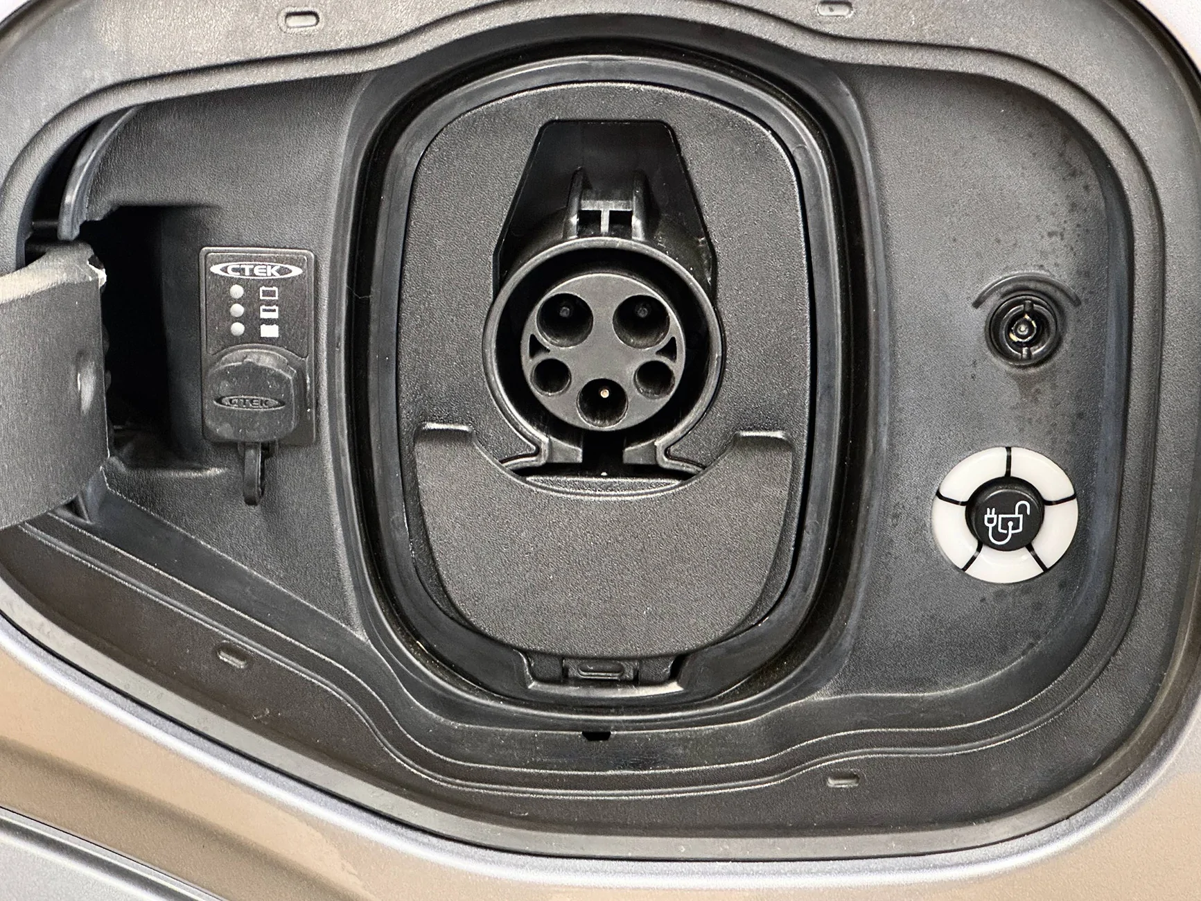 Ford F-150 Lightning Battery tender leads thru charge port cover Charge 12V battery-with CTEK trickle charger outlet under charge port fla