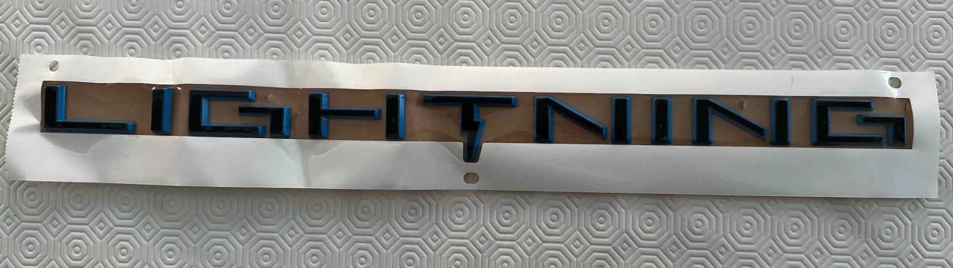 Ford F-150 Lightning Rear Lightning lettering glue issues 1764601069753-io