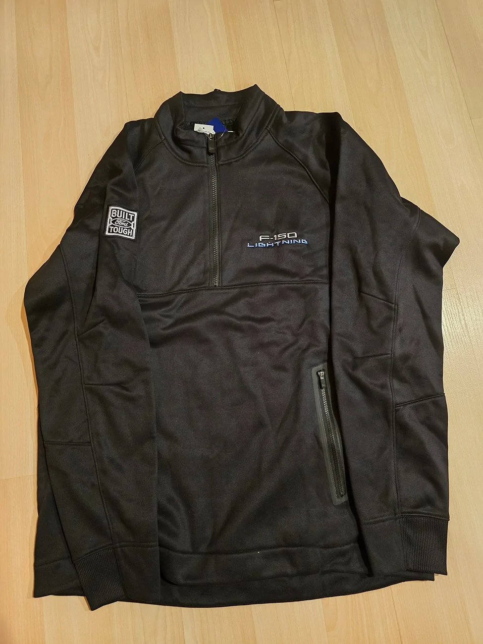 Ford F-150 Lightning Brand new official Lightning branded black quarter zip (L) and hat. Free + shipping costs 1000045595