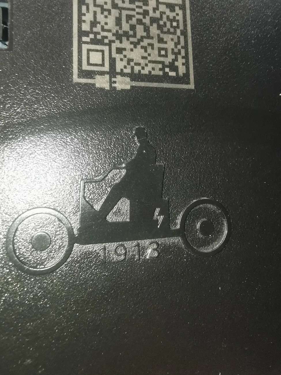 Ford F-150 Lightning I just noticed this easter egg in the charge port door. IMG_20251212_114353