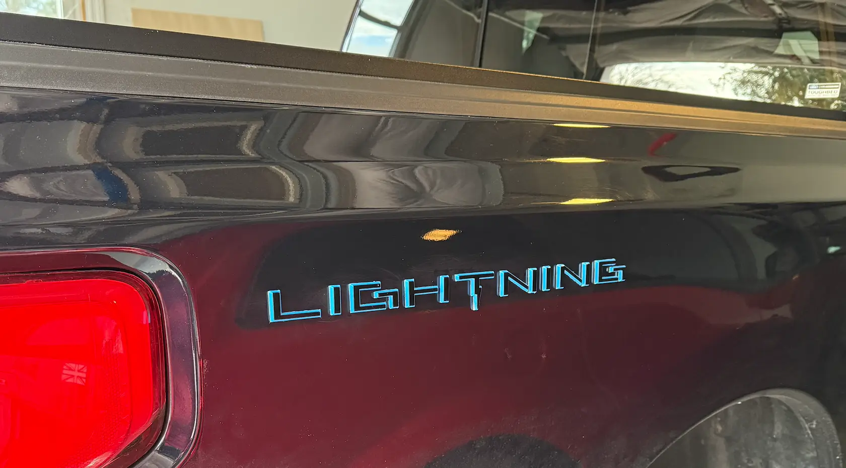 Ford F-150 Lightning Rear Lightning lettering glue issues 1766367775355-va