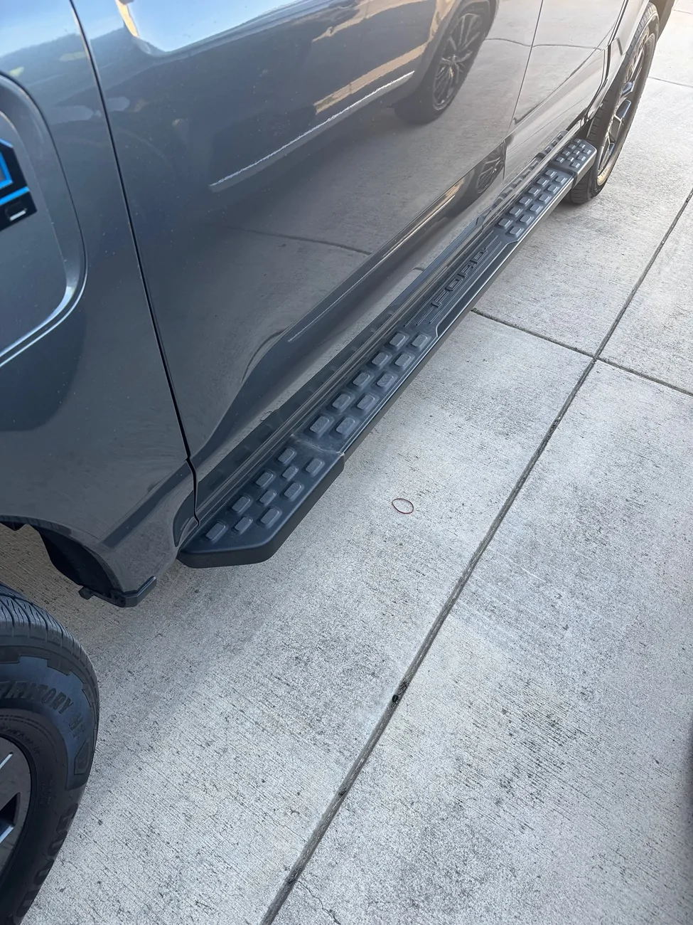 Ford F-150 Lightning Can someone tell me what the part numbers for the running board caps are for this running board? IMG_1804