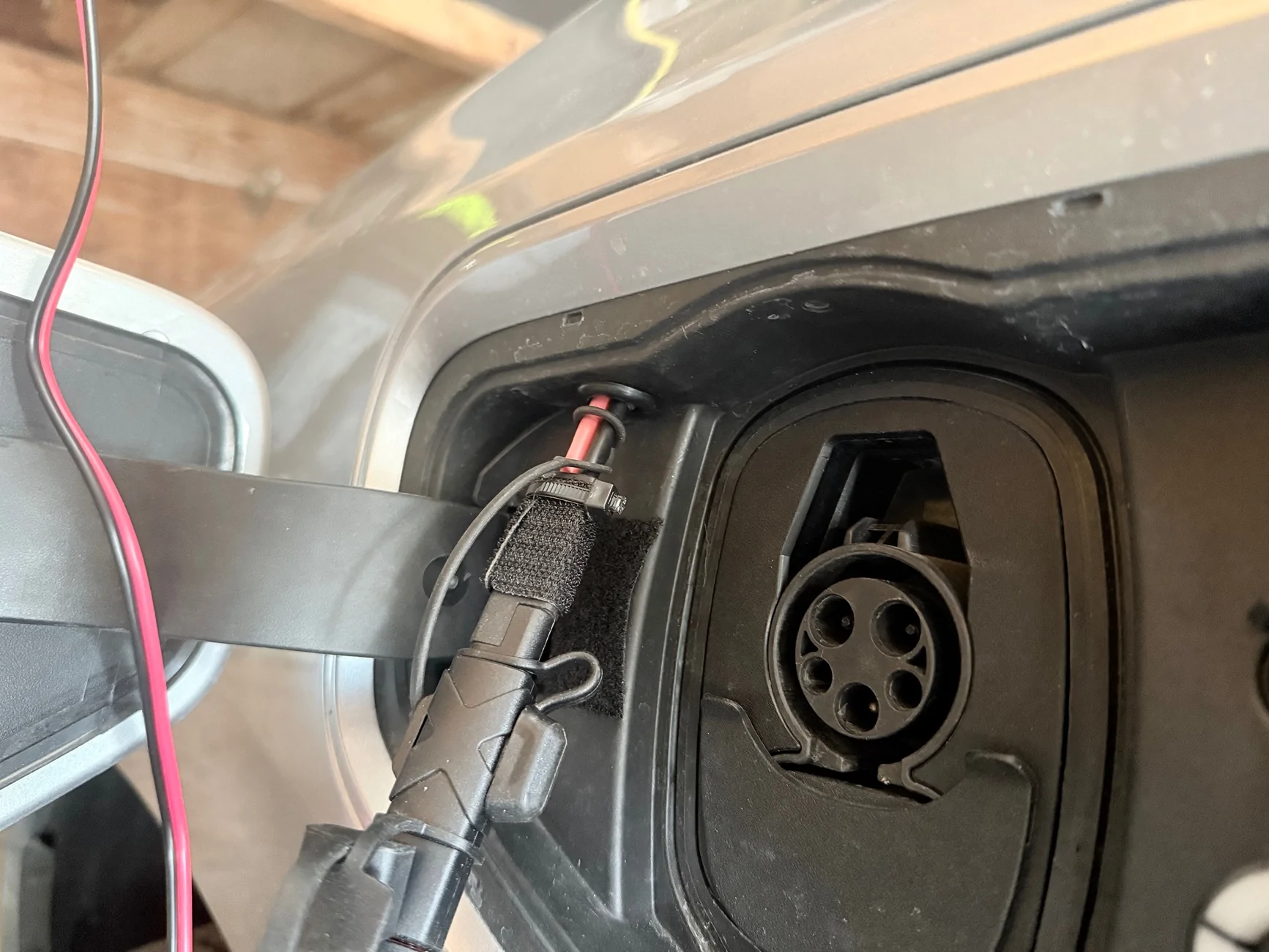 Ford F-150 Lightning Battery tender leads thru charge port cover IMG_0922