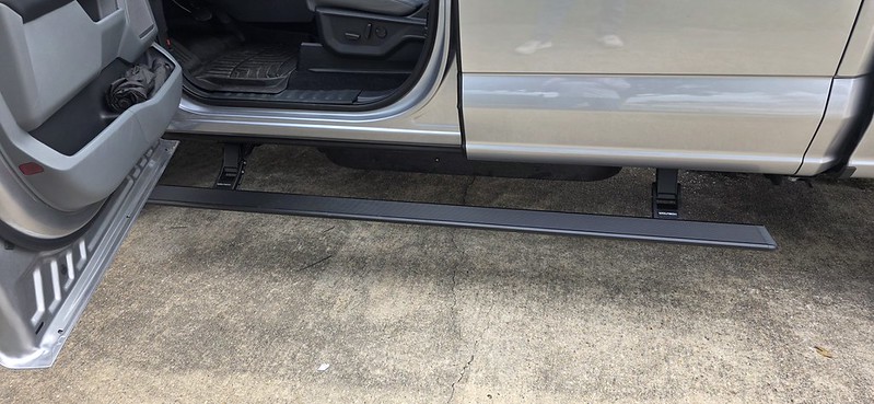 Ford F-150 Lightning Wolfbox powered running boards installed. 55101908959_06522c7d31_c