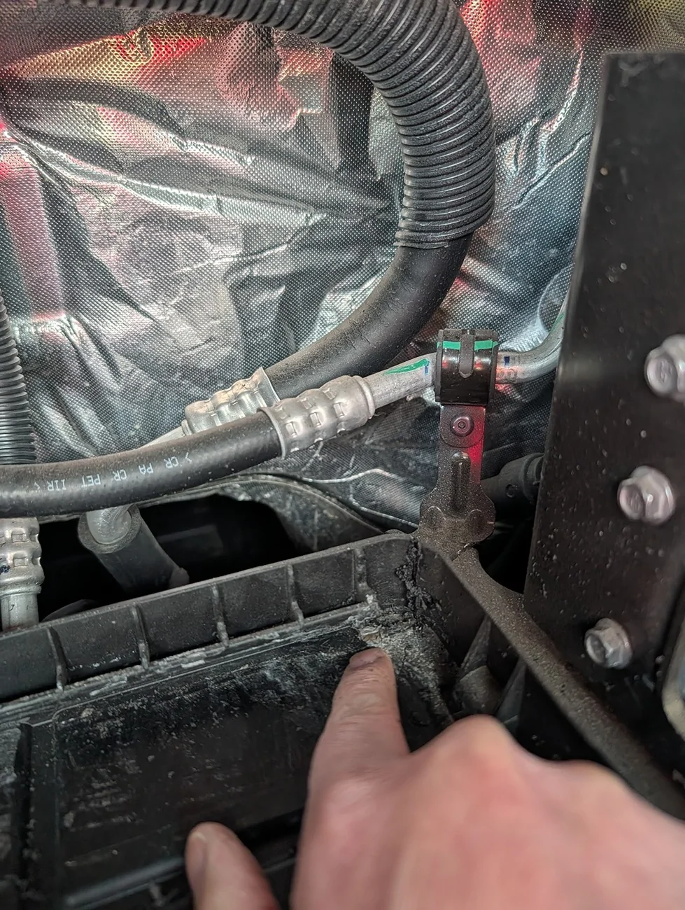 Ford F-150 Lightning 12V Battery replacement with H4 RightRearHoldDown