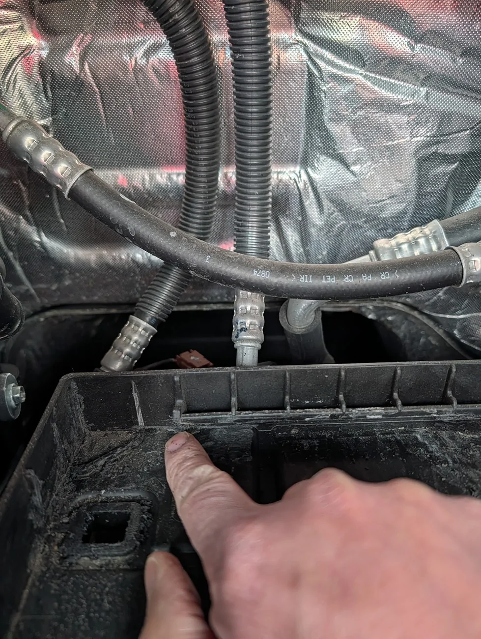 Ford F-150 Lightning 12V battery replacement poll LeftRearHoldDown