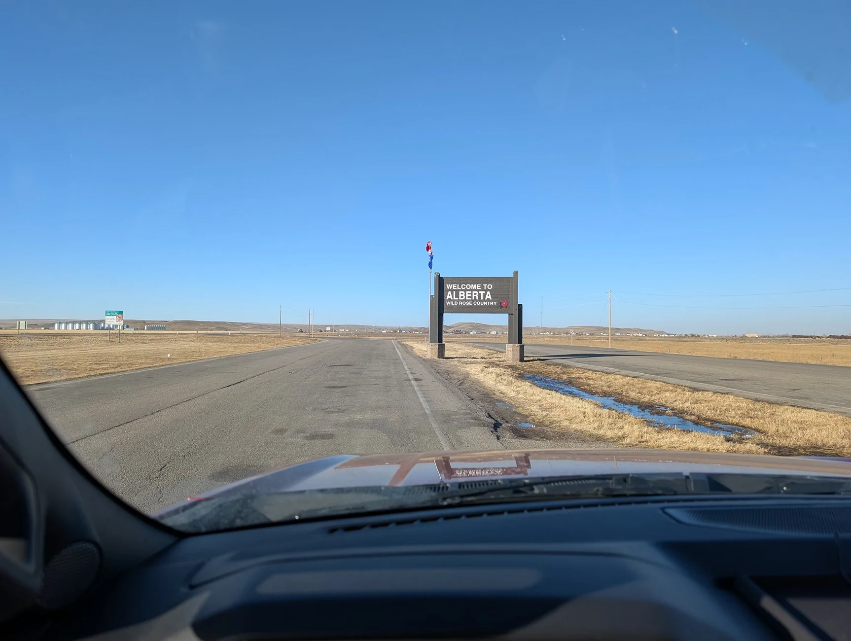 Ford F-150 Lightning Just completed longest trip, 5,461 miles Alberta flags whipping