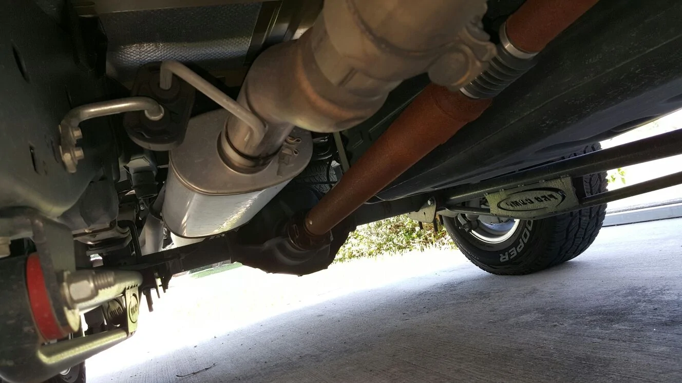 Ford F-150 Lightning Rust notes near the rear motors when looking randomly under the ~TRUCK~ 2026-05-18_06-36-00