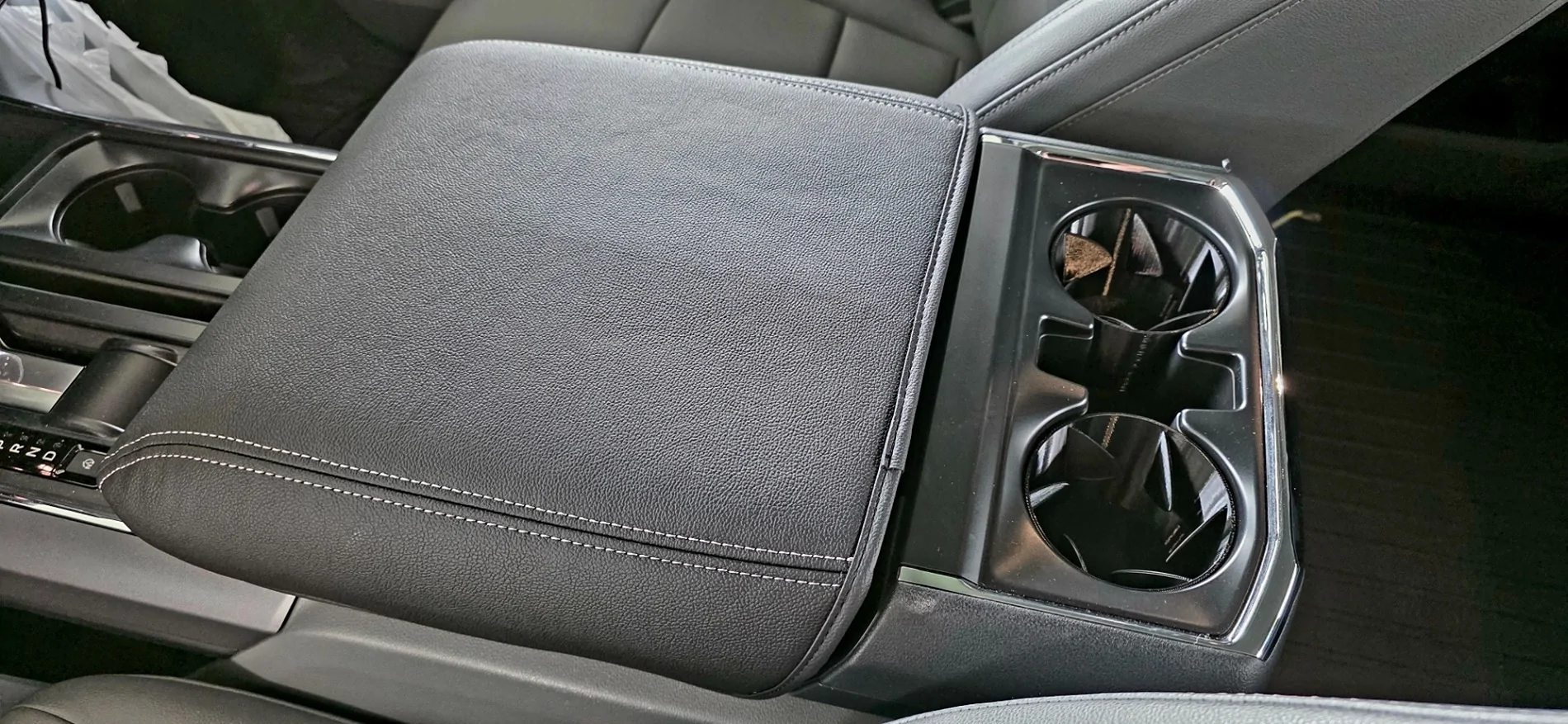 Ford F-150 Lightning Armrest/console lid padding is too thin. 25lightningconsolelidcover