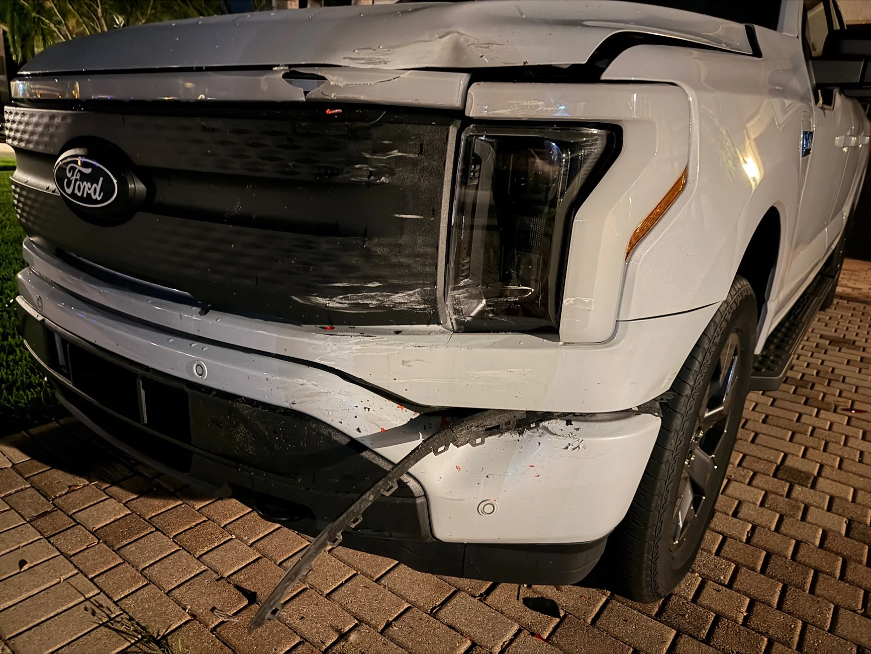Ford F-150 Lightning Neighbor backed into truck what to look out for when opening frunk and repairs IMG_7365