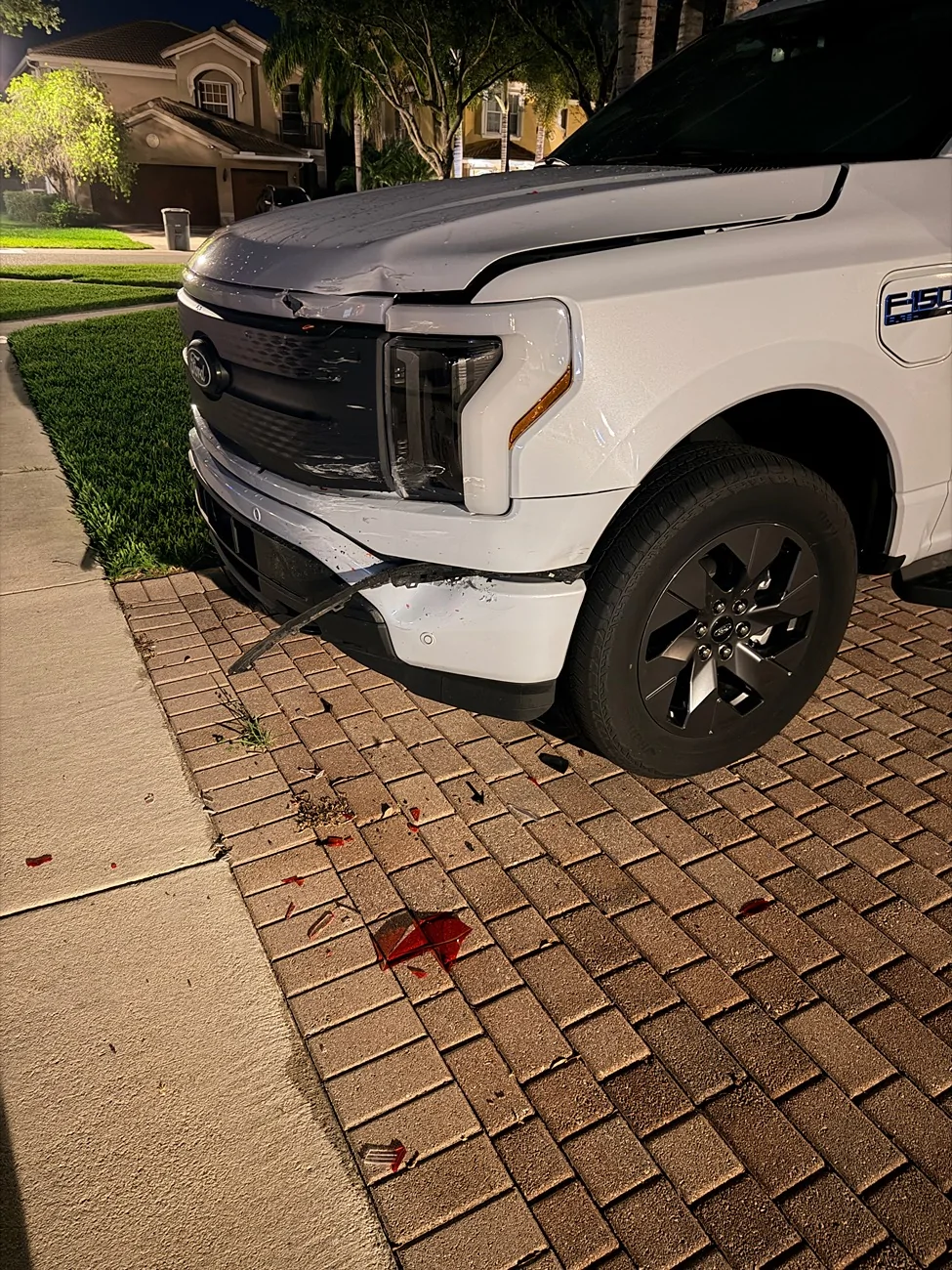 Ford F-150 Lightning Neighbor backed into truck what to look out for when opening frunk and repairs IMG_7364