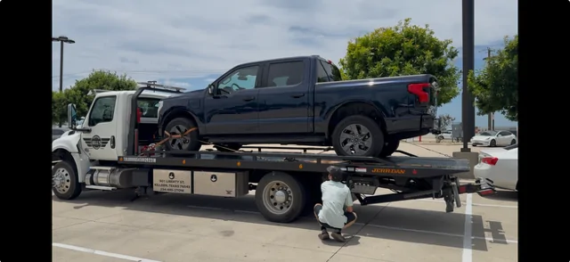 Ford F-150 Lightning Red Ring & a Long Tow Home View recent photos