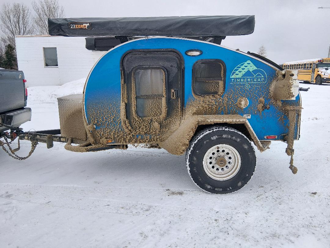 Ford F-150 Lightning Everyone is Towing Timberleaf Pika with 180 awning - naked