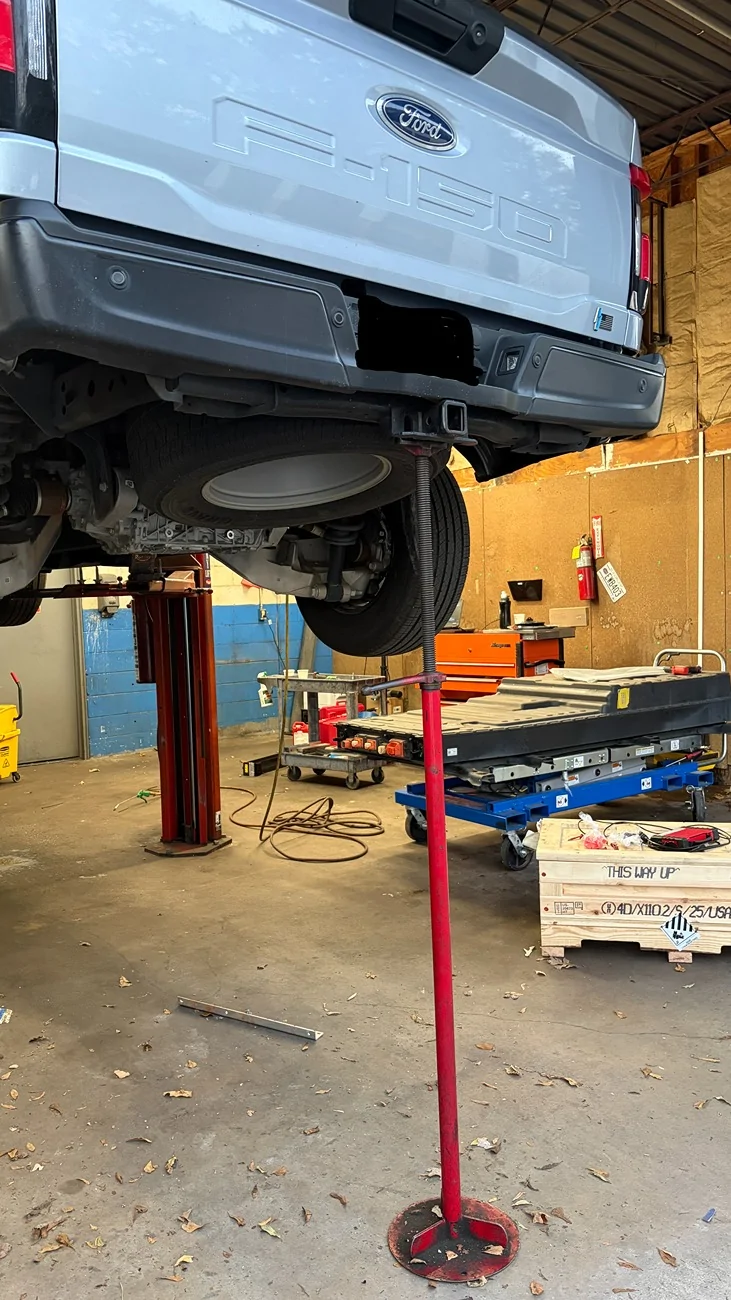 Ford F-150 Lightning F150 Lightning EV Fire in Service Bay 11 12 up on the rack