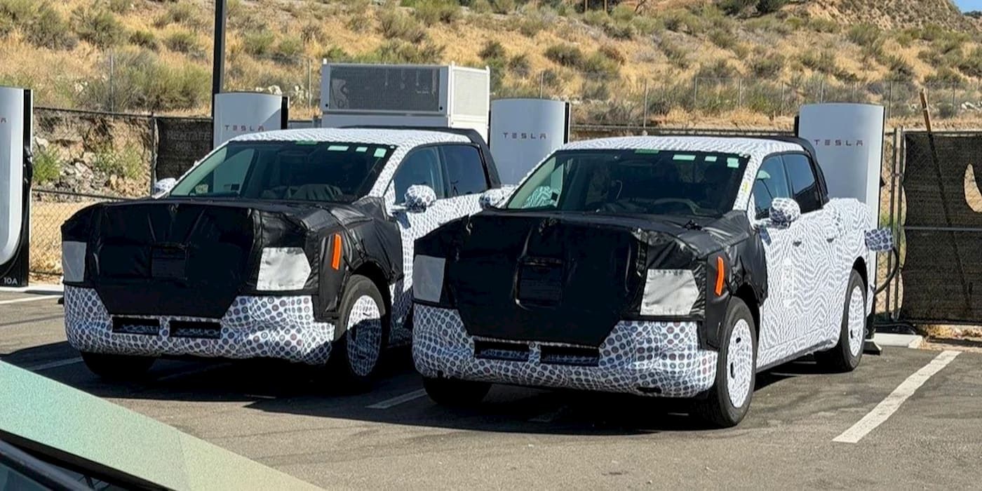 Ford F-150 Lightning It's TINY! Ford's new $30k EV truck spotted (in camo) next to an Expedition for scale Ford-EV-pickup-Tesla-Supercharger