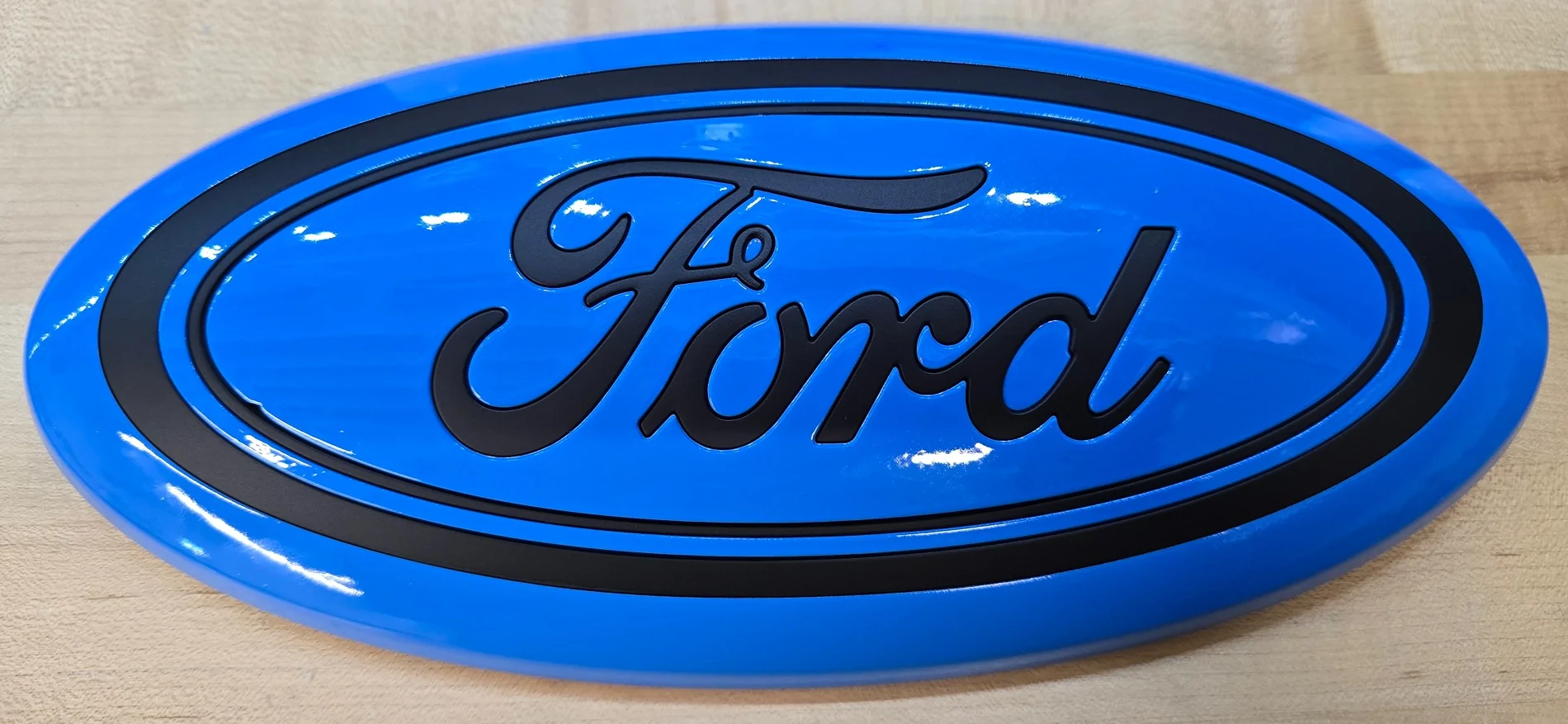 Ford F-150 Lightning Anyone know a paint color that matches the light blue accent of the Lightning emblem? 20260721_141329