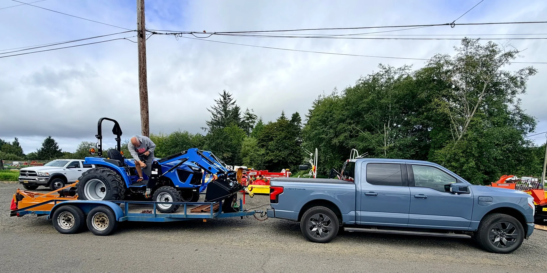 Ford F-150 Lightning Towing compact tractor-loader w/ 5' mower on dbl axle IMG_2369