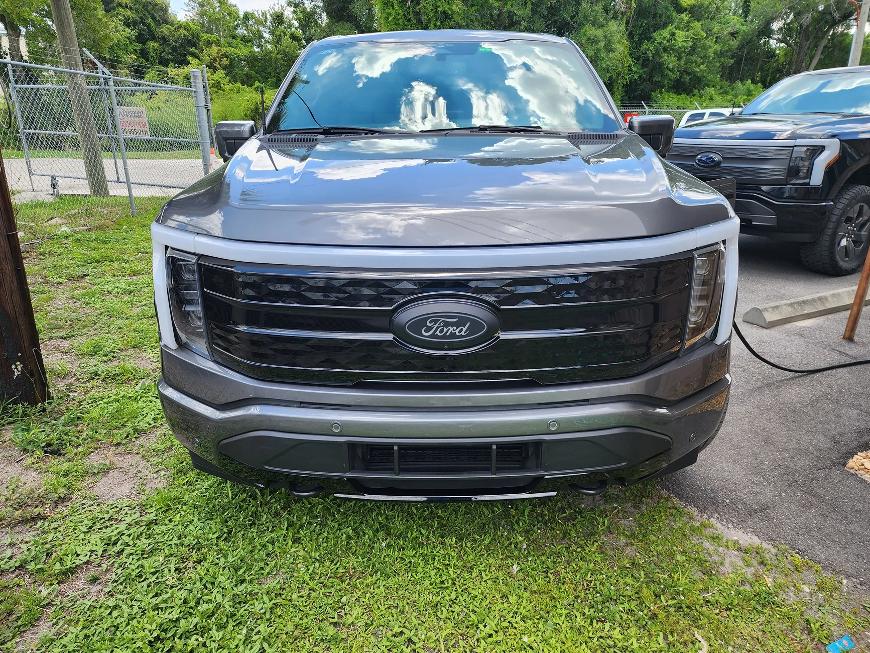 Ford F-150 Lightning Light bar + tinted ppf = a more subtle front end look Black Grill #2