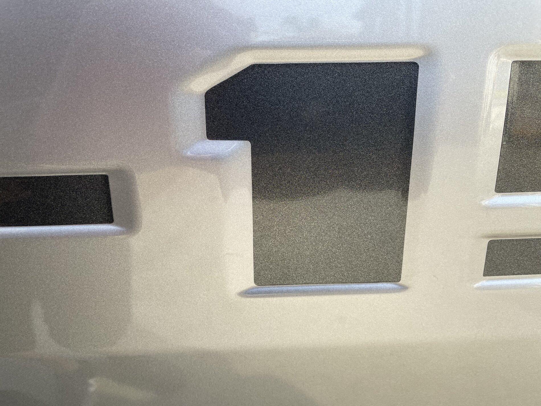 Ford F-150 Lightning Applied vinyl lettering on tailgate A7B83F8F-5B23-4E14-9063-20453C127A21