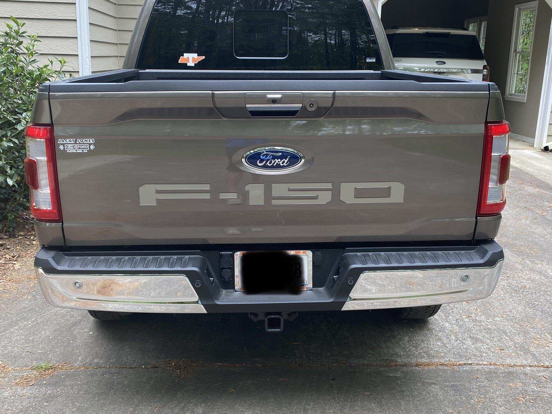 Ford F-150 Lightning Applied vinyl lettering on tailgate 29122EA7-D631-4CD4-9DE9-F5A926103EC5
