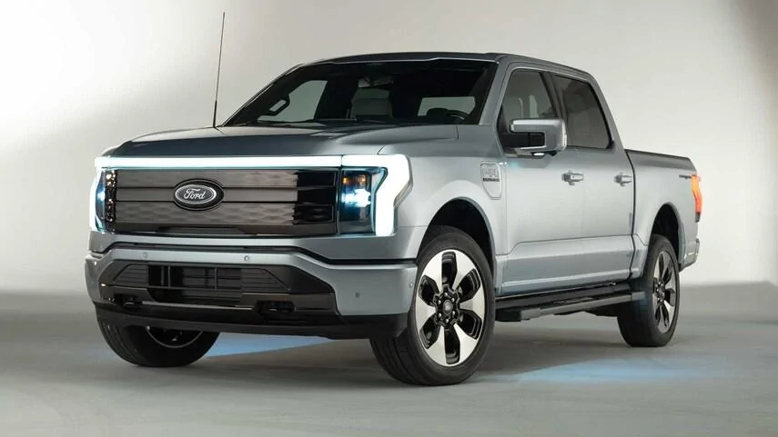 Ford F-150 Lightning ? Studio pics of the F-150 Lightning Electric Pickup 2022-Ford-F-150-Lightning-front-three-quarter-vi