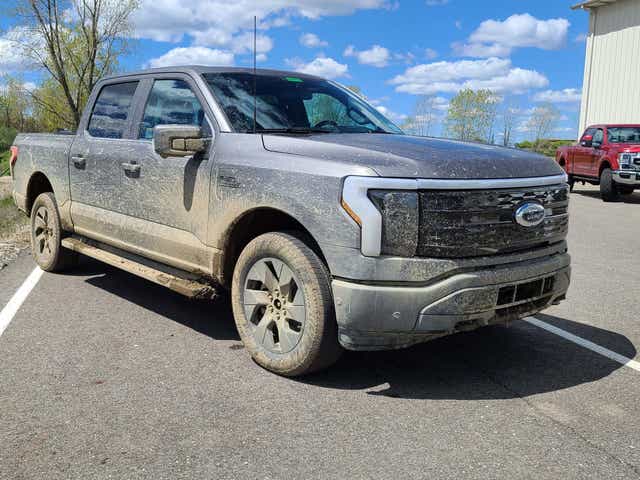 Ford F-150 Lightning Official 2022 F-150 Lightning Specs, Pricing, Photos & Videos! 64cce71d-3f49-4685-b731-c7bb9aab88ac-FordF150Lightning_mud-fr3-4-1
