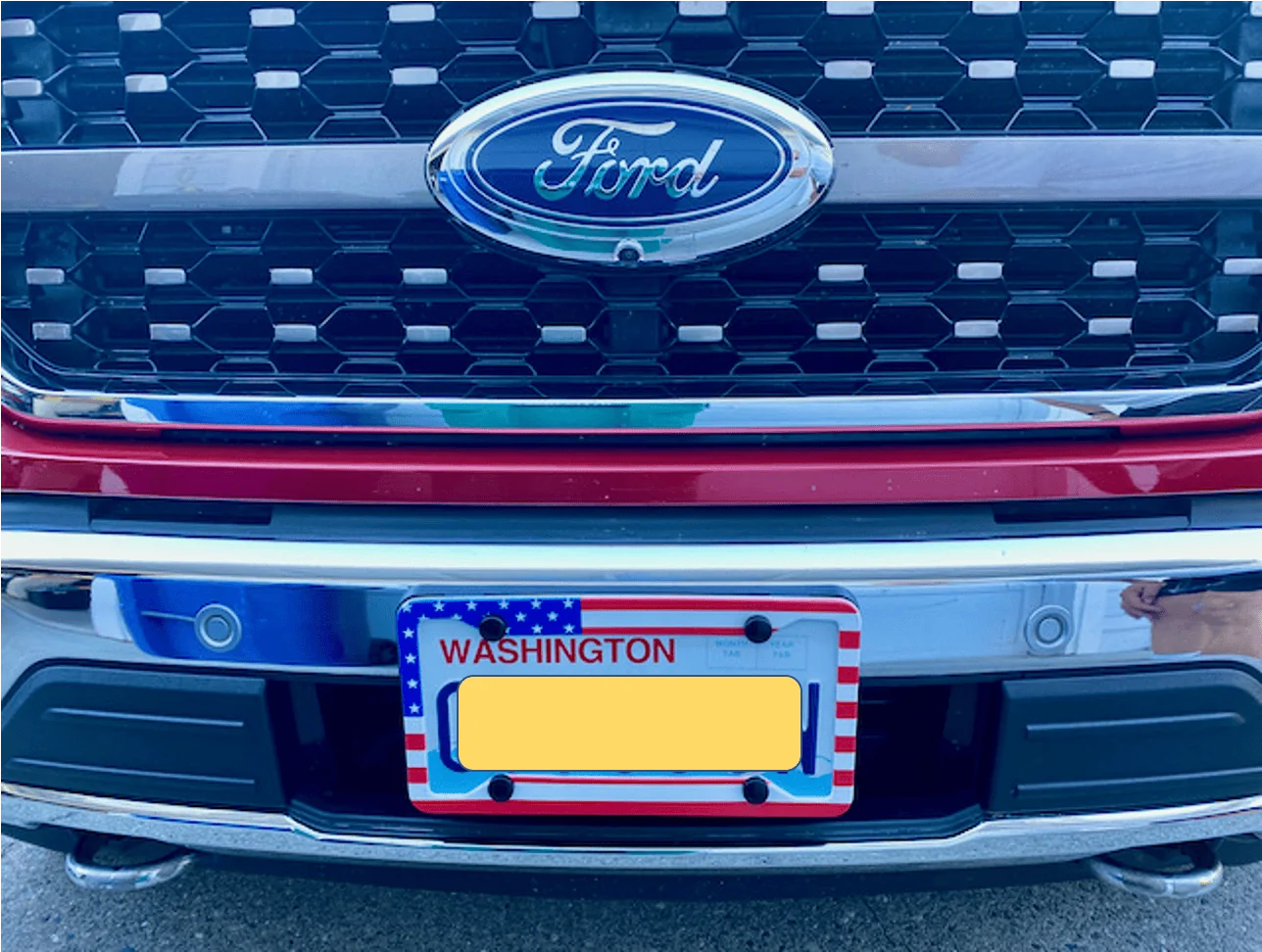 Ford F-150 Lightning How about getting that front license plate bracket off? 1625535201129