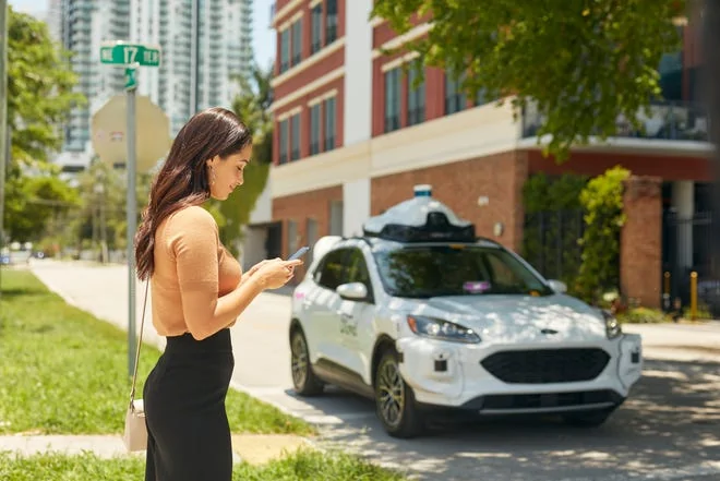 Ford F-150 Lightning Ford, Argo AI Team With Lyft To Launch Self-Driving Robotaxi Service In Miami, Austin dec3-eacf-42e0-b0ef-ee0bf7ea54f6-Lyft-Argo-Ford_01