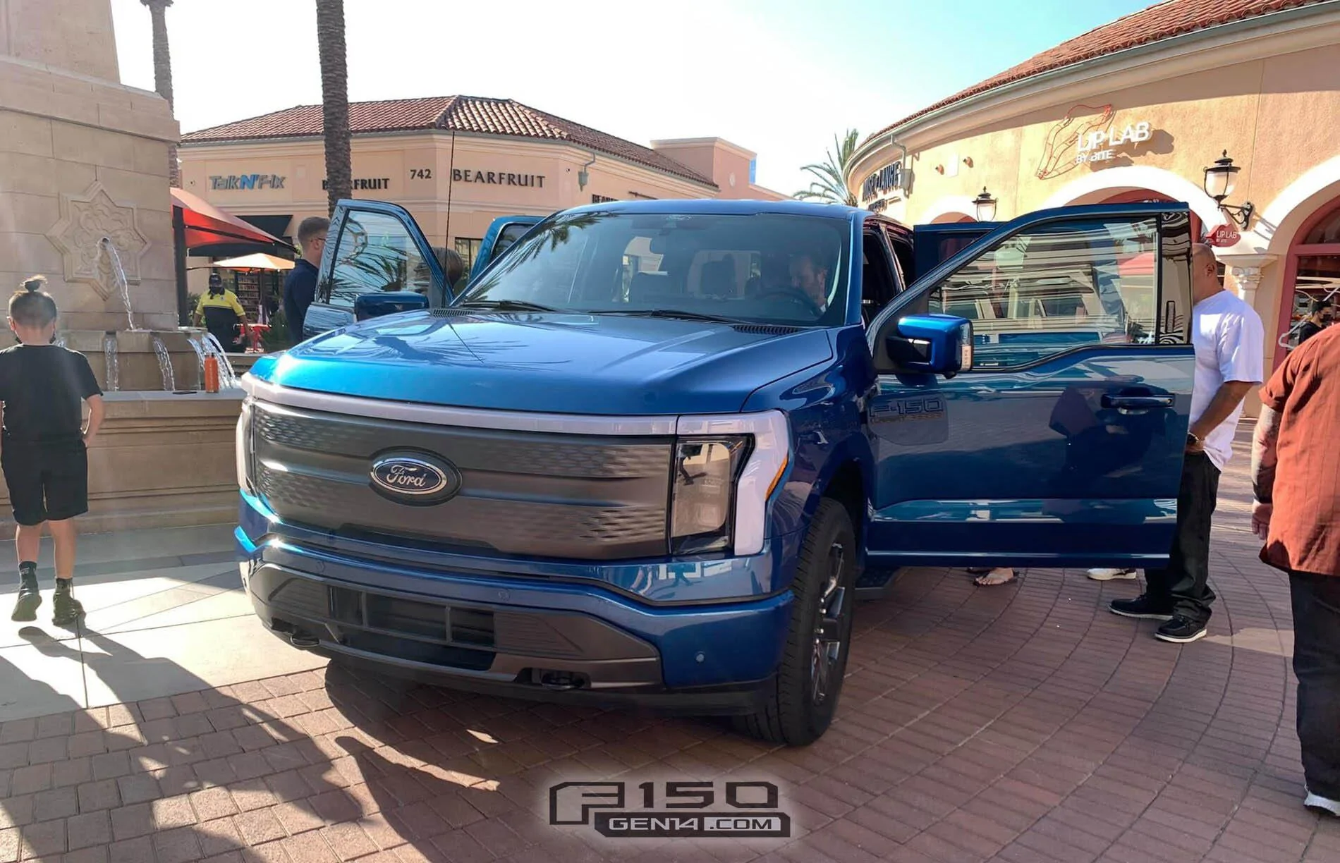 Ford F-150 Lightning Atlas Blue F-150 Lightning Pics From Irvine Spectrum, CA atlast-blue-f-150-lightning-ev-pickup-3-jpg-jpg