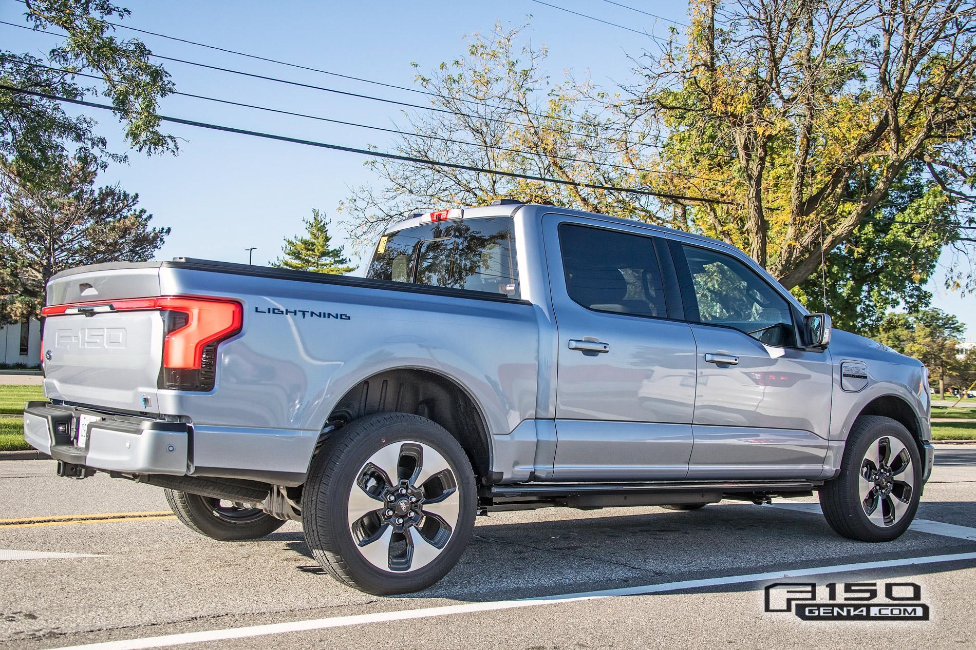 Ford F-150 Lightning F-150 Lightning Platinum (Iconic Silver) & Lariat (Rapid Red) Spotted On Public Roads Iced Blue Silver 2022 F150 Lightning Platinum EV Truck Spotted 9