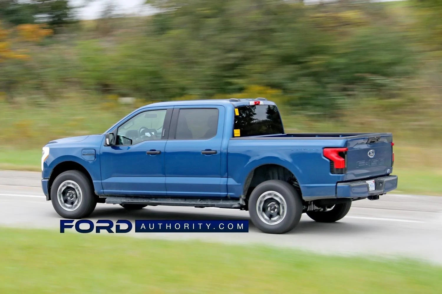 Ford F-150 Lightning ATLAS BLUE F-150 Lightning Photos & Club 2022-F-150-Lightning-XLT-in-Atlas-Blue-On-The-Road-Photos-November-2021-Exterior-008