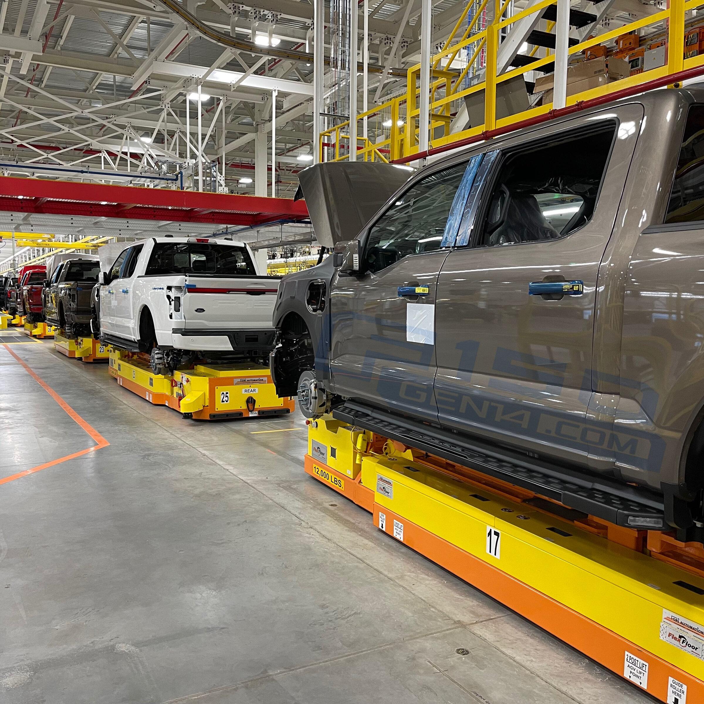 Ford F-150 Lightning Inside Rouge Factory: Atlas Blue, Stone Gray, Oxford White F-150 Lightning + bonus Iced Blue Silver pics 2022 F150 lightning oxford white and stone gray