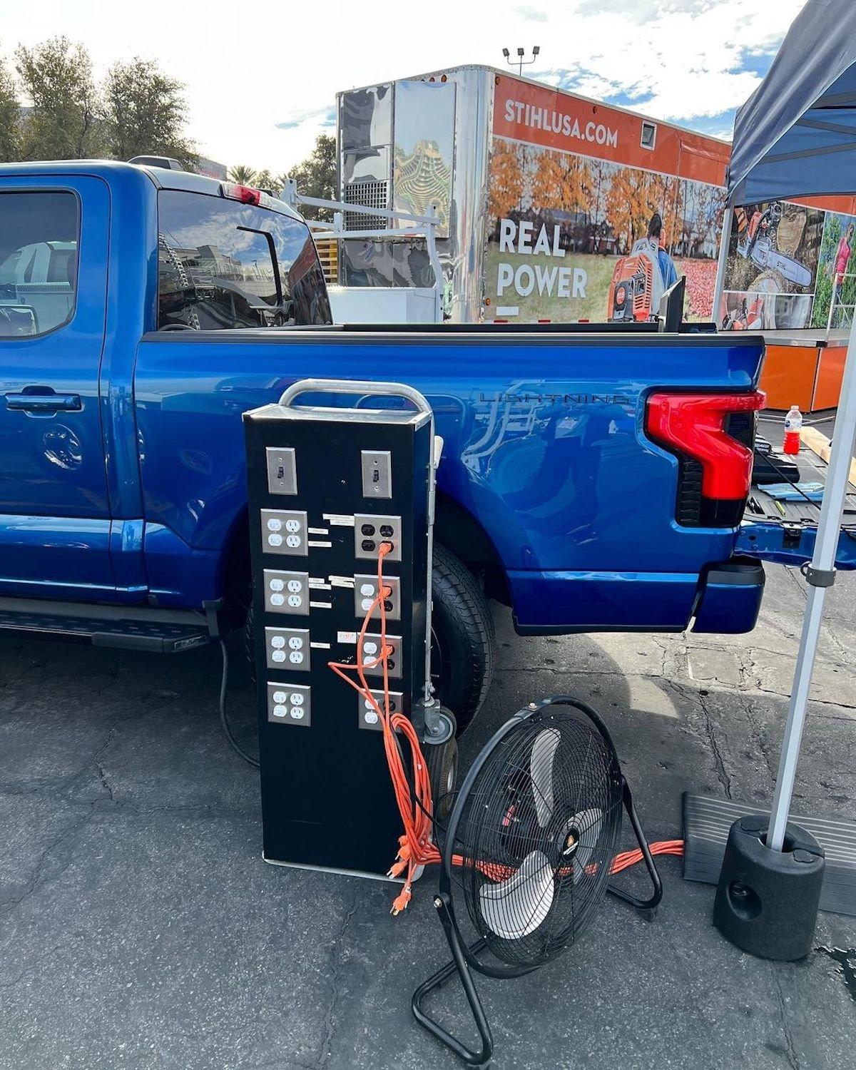 Ford F-150 Lightning Lightning Lariat in Atlas Blue Being Exhibited at World of Concrete Show in Las Vegas Atlas Blue F150 Lightning Lariat EV Pickup World of Concrete 2