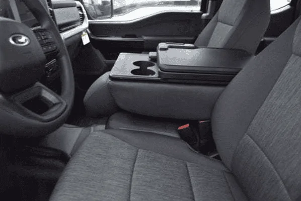 Ford F-150 Lightning Has anyone converted their fold down armrest (40/20/40 front seats) to a flip-up storage bin? 1646629171672