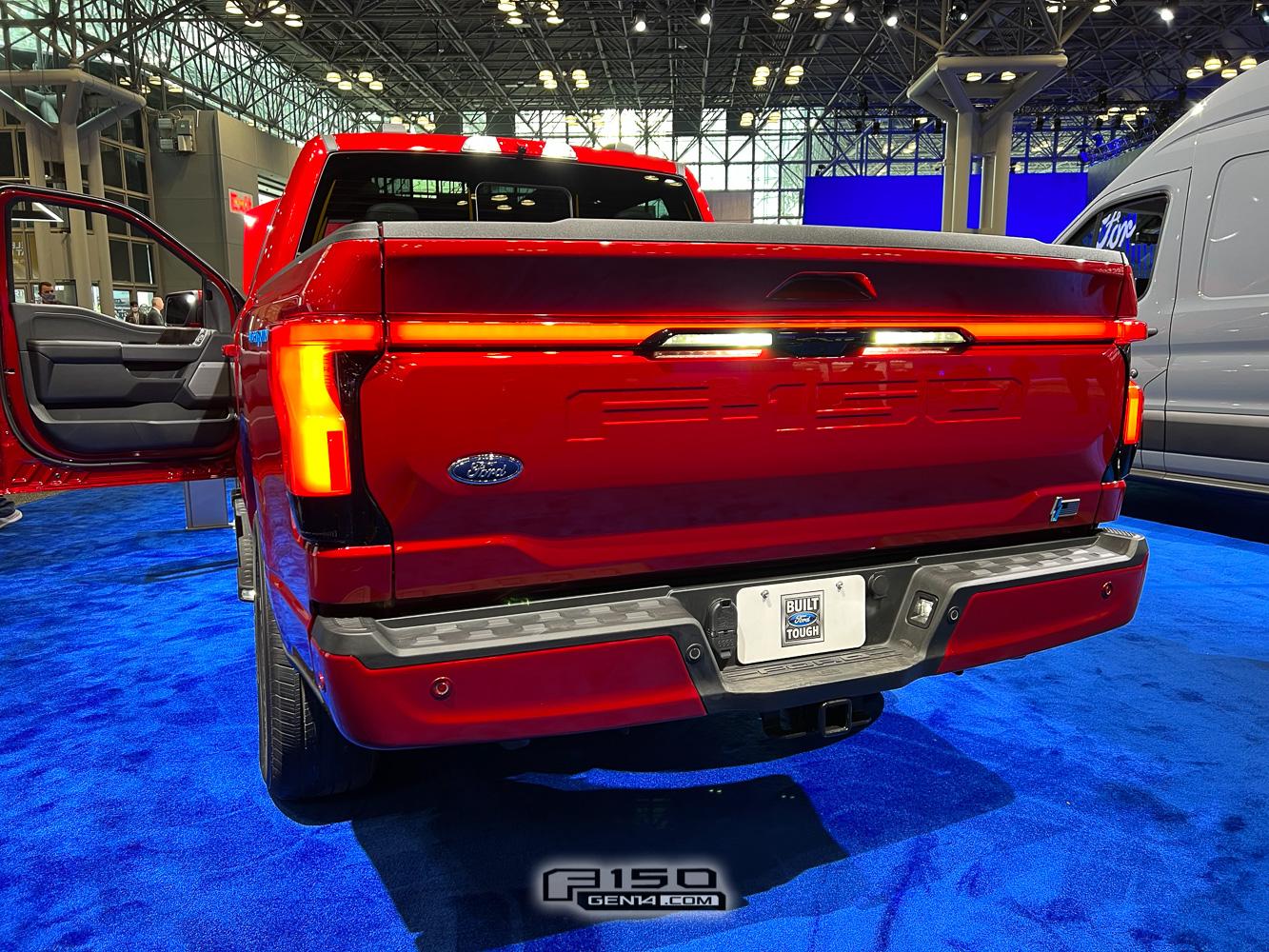 Ford F-150 Lightning RAPID RED F-150 Lightning Photos & Club rapid-red-f150-lightning-nyias-2022-5